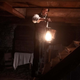 Adrien Brody holds a lantern in a dark room on Epix's Chapelwaite.